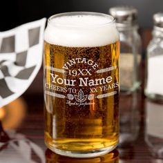 a close up of a beer glass on a table