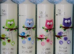 four personalized candles with owls and hearts on them