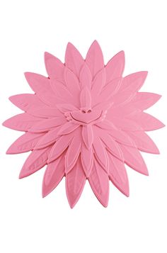 a pink flower shaped object on a white background with clippings to the side