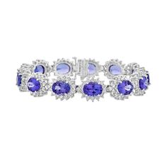 td {border: 1px solid #ccc;}br {mso-data-placement:same-cell;} 9x7mm Blue AAAA Tanzanite Bracelet Oval shape 25.46 ct with 5.94 cttw Diamond in 14K WG Product Information SKU B2046/1 Metal Type 14K Metal Color WG Ring Style - Primary Stone Gemstone Name Tanzanite Gemstone Species Zoisite No. Of Gemstones 13 Gemstone Shape Oval Gemstone Color Blue Gemstone Grade AAAA Gemstone Clarity VVS Gemstone Weight 25.46 Gemstone Size 9x7 Gemstone Composition Natural Gemstone Treatment Heated Origin Tanzania Tanzanite Bracelet, Tanzanite Jewelry, Tanzanite Stone, White Gold Bracelet, Tanzanite Gemstone, Pretty Bracelets, Ring Style, Fantasy Jewelry