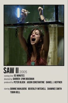 the poster for saw ii shows a woman with her hands in the air, and another person holding something up above her head