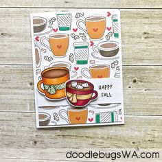 a close up of a card with coffee cups