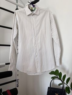 The Hermes Man's shirt is in great condition, without any defects length 75cm / 19.5in shoulders 46cm / 18in bust 59cm / 23.2in waist 55cm / 21.6in sleeve 63.5cm / 25in Spring Cotton Dress Shirt With Striped Collar, Classic Button-up Tops With Striped Collar, Formal Cotton Shirt With Striped Collar, Fitted Dress Shirt With Striped Collar For Business Casual, Pinstripe Button-up Office Shirt, Pinstripe Button-up Shirt For Office, Classic Striped Shirt For Workwear, Classic Pinstripe Tops For Workwear, Office Cotton Shirt With Vertical Stripes