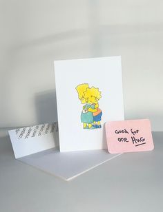 a card with the simpsons character on it next to a note that says good for one hug