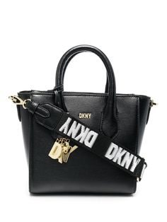 logo-plaque tote bag from DKNY featuring jet black, gold-tone logo plaque, two top handles, single shoulder strap and main compartment. | DKNY Logo-Plaque Tote Bag Dkny Logo, Coach Swagger Bag, Black Tote Bag, Jet Black, Calf Leather, Top Handle Bag, Shoulder Strap, Handles, Tote Bag