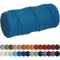 a spool of blue twined rope with different colors and sizes in the background