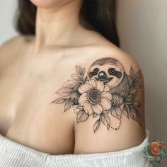 a woman with a slotty tattoo on her shoulder