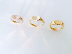 An elegantly modern take on a classic signet ring with a softly scooped, concave face. Wear alone or stack together   Available in Silver, 14k Green Gold, 14k Rose Gold, 18k Venetian Brown Gold, and 22k Yellow Gold.    Please allow 6-8 weeks for completion as each piece is made to order. Modern Yellow Gold Domed Signet Ring, Elegant Formal Signet Ring With Concave Shape, Modern Domed Signet Ring For Gift, Elegant Concave Signet Ring For Formal Occasions, Modern Domed Signet Ring As Gift, Rose Gold Heirloom Signet Ring, Rose Gold Oval Signet Ring In Fine Jewelry Style, Fine Jewelry Rose Gold Oval Signet Ring, Concave 14k Gold Ring Gift