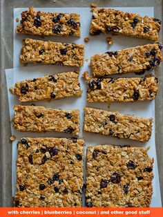 granola bars with blueberries, coconut and other good stuff on a baking sheet