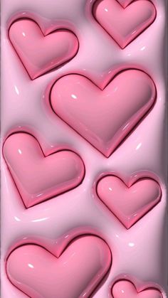 pink hearts are arranged in the shape of heart shapes