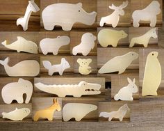 various wooden animals are shown on display