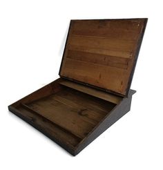 an open wooden box on a white background