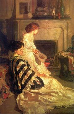 two women sitting next to each other in front of a fire place