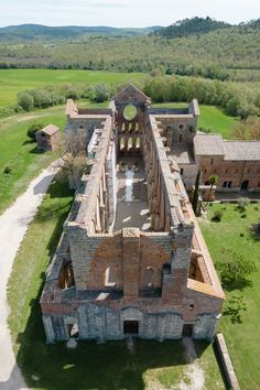 an aerial view of the ruins of a castle