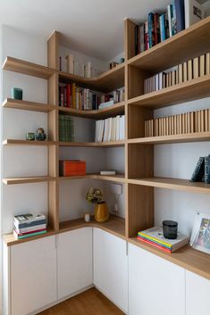 an empty bookshelf with many books on it