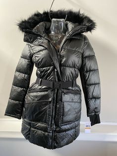 STUNNING!! 100% AUTHENTICNWT MICHAEL KORS WOMEN'S SHINY BLACK BELTED PUFFER JACKET COAT WITH FUX FUR / SHERPA TRIM  REMOVABLE HOOD.  "SHINY BLACK" COLOR  SHINY NYLON FABRIC AND SCUBA STRETCH TRIM, FULLY LINED, FULL ZIP, SIDE ZIP POCKETS. STYLE: A421174B56 SHELL: 100% NYLON UNDER SLEEVES: 92% POLYESTER 8% SPANDEX LINING: 100% POLYESTER LAY FLAT MEASUREMENTS APPROX:  SIZE S: ARMPIT TO ARMPIT: 20.5"   WAIST: 19"    HIPS: 21.5"    SHOULDER TO HEM: 32" SIZE M: ARMPIT TO ARMPIT: 21.5"    WAIST: 20 Hooded Michael Kors Outerwear For Fall, Hooded Michael Kors Fall Outerwear, Michael Kors Hooded Fall Outerwear, Michael Kors Winter Outerwear With Pockets, Fall Hooded Michael Kors Outerwear, Fitted Michael Kors Winter Outerwear, Michael Kors Winter Workwear Outerwear, Michael Kors Long Sleeve Outerwear For Fall, Michael Kors Outerwear For Cold Weather In Fall