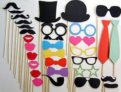 a group of photo props made to look like mustaches, glasses and bow ties