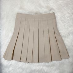 Brand New Never Worn 24in Waist 15.5 Length Fitted Beige Tennis Skirt For Spring, Trendy Fitted Beige Tennis Skirt, Fitted Beige Pleated Tennis Skirt, Fitted Pleated Beige Tennis Skirt, Fitted Pleated Beige Mini Skirt, Beige Non-stretch Casual Pleated Skirt, Casual Non-stretch Beige Pleated Skirt, Beige Pleated Skirt, Pleated Skirt