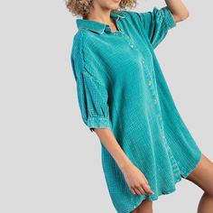 Embrace effortless chic with the ‘Azurine Dream Button-Down Shirt Dress’, a versatile addition to your wardrobe that’s perfect for any season. This shirt dress features a fresh turquoise hue with a subtle texture that adds depth and sophistication to the piece. The relaxed fit ensures comfort, while the high-low hem offers a modern touch. Style it as a breezy mini dress for those warm days out or layer it over leggings for a sleek, transitional look. For an evening out, cinch it with a belt, add Green Blue Dress, Simple Tank Tops, Light Cardigan, Button Down Shirt Dress, Minimalist Dresses, Teal Turquoise, Trendy Boho, Midi Dress Casual, Turquoise Green