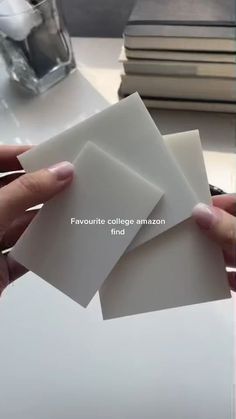 someone is holding four pieces of paper on top of each other with the words favorite college amazon find