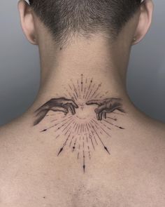 the back of a man's neck is shown with hands and stars on it