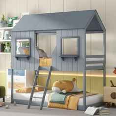 a child's bedroom with a bunk bed, desk and bookshelf in it