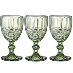 three green goblets sitting next to each other