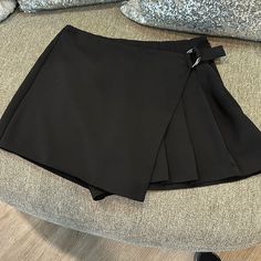 Zara Shorts In The Color Black In A Medium Size With A Cover-Up In The Front That Has A Beautiful Detailed With A Silver Buckle And Has Some Pleading On The Side Of The Shorts. The Cover-Up Is Longer Than The Short So Higher In The Back Obviously, This Is New Without Tags Condition Very Cute Like A Small Size Zara Pleated Bottoms For Night Out, Short Pleated Party Bottoms, Black Skort With Belt Loops For Summer, Casual Pleated Shorts For Night Out, Short Pleated Bottoms For Night Out, Zara Pleated Bottoms For Day Out, Zara Pleated Party Bottoms, Zara Short Skort For Night Out, Trendy Pleated Zara Bottoms