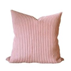 a pink pillow on a white background