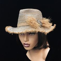 Whittal & Shon Finely Woven mix fiber fedora with whimsical raffia trim and jewel sea turtle brooch. This collapsable floppy fedora is ideal for the stylish world traveler. The light weight non-constructed body allows for easy packing and neutral tones makes it fitting for almost any outfit. The adjustable sweatband accommodates almost any head size. Turtle Brooch, Easy Packing, Derby Hats, Beautiful Hats, Fedora Hat, World Traveler, Neutral Tones, Sea Turtle, Fedora