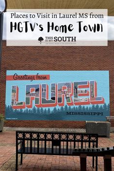 a bench in front of a large mural on the side of a building with words that read, places to visit in laurel ms from hgt's home town this south