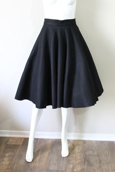 Vintage 50's Original Carole Chris of California Black FELT Full Circle Skirt Rockabilly swing  Original Vintage California Black Felt Circle Skirt. Metal zipper with button waist.  Make sure to Favorite my Store and check back for new items. Excellent Condition.   No holes or rips. Modern Size US 2 Size XXS/XS Waist up to 26 inches  (can adjust the waist up to 26 inches by moving the button) The waistband itself is up to 13 inches across FULL CIRCLE  Length Top to Bottom: 27 inches (ET-22*22) Rockabilly Skirt, Full Circle Skirt, Vintage California, Full Circle Skirts, Black Felt, Modest Fashion Outfits, Full Circle, Circle Skirt, Black Skirt