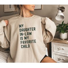 "You will love this funny mom sweatshirt! These cozy crewnecks make hilarious gifts for your mom if she seems to like your wife more than you, or funny Mothers Day Gifts from her kids or favourite daughter-in-law! Not to mention these sweaters are so soft and comfortable - mom is sure to laugh and be comfy at the same time! *PRODUCT DESCRIPTION* -Gildan 18000 Unisex Crewneck Sweatshirt -50% cotton, 50% polyester -Medium-heavy fabric -Sewn-in label -Shirt colour may vary slightly due to variations in lighting and monitor brightness *SIZING* -Loose fit -Runs true to size -See size guide in product photos for measurements -I am 5'5\" and 135lbs and a medium is perfect for me -Size up two sizes for an oversized fit *CARE INSTRUCTIONS* -Machine wash cold on delicate cycle -Lay flat to dry -Do n Little Sister Gifts, Papa Shirts, Aunt Gifts, Mom Sweatshirt, Funny Sweatshirts, Teacher Humor, Fete Halloween, Pride Shirts, Godmother