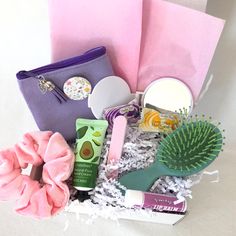 Glam-on-the-go! All you need in your purse for a quick refresh. Canvas make-up bag, compact mirror, velvet hair scrunchie, scented hand lotion, lip balm, nail file and mini hair brush. Perfect to buy for yourself or to give as a gift.  Gift box is 7" x 5" x 4". Note: colors of items will vary. Coordinating colors will be chosen for your box. **To include a personal gift message, write message in Note to Seller** Mini Hair Brush, Beauty Gift Box, Purse Essentials, Beauty Supplies, Stylish Purse, Velvet Hair, Beauty Must Haves, Gift Message, Hand Lotion