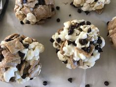 chocolate chip cookies with marshmallows and oreo chips on the top are ready to be eaten