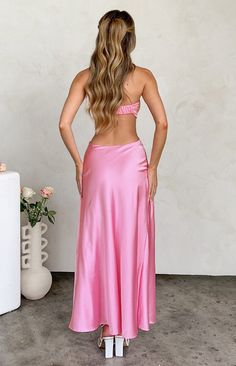 Pink Strapless Maxi Dress

How to style:
This stunning maxi dress () is perfect for your next formal event. Pair with dainty gold jewellery () and statement heels  ()and you will have heads turning.

Features:
  
 * Light weight material 
 * Satin 
 * Maxi length 
 * Strapless 
 * Tie up at the front 
 * Cut outs on both sides 
 * Bias cut Statement Heels, Short Formal Dress, Prom Midi Dress, 60's Dress, Summer Playsuit, Semi Formal Dresses, Strapless Maxi, Beginning Boutique, Glitter Dress