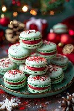 Festive green and red macarons sprinkled with candy canes on a plate, surrounded by holiday decorations. Macrons Recipes Christmas, Macaroons Recipe Christmas, Nutcracker Dessert Ideas, Gourmet Christmas Desserts, Thanksgiving Macaroons, Holiday Baking Championship Recipes, Smores Macarons, Hot Cocoa Macarons, Pecan Pie Macarons