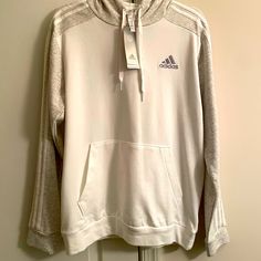 Adidas Men’s White And Gray Hoodie Sweater Size M Nwt Adidas White Hoodie In Athleisure Style, Adidas White Hoodie For Athleisure, White Three Stripes Hoodie For Winter, White Adidas Hoodie For Winter, White Three Stripes Branding Hoodie For Winter, White Sweatshirt With Three Stripes For Sports Season, White Three Stripes Sweatshirt For Sports Season, White Winter Sweatshirt With Three Stripes Branding, Winter White Sweatshirt With Three Stripes Branding