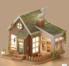 a paper model of a small house with lights on the front door and windows in the roof