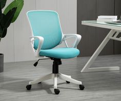 a blue office chair sitting in front of a white desk