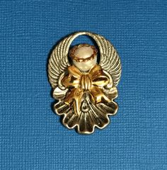 Guardian Angel Pin #223 plain halo  This elegant angel pin is available in antique silver with a gold halo, a pearl head, and a gold bow. Size: 1 1/2"x 1 1/2"  #angel #angelpin Angel Locket, Angelic Gold Necklace For Gift, Halo Angel