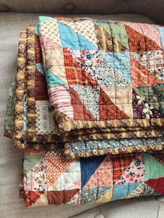 two pieces of quilt sitting on top of each other