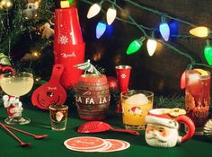 various christmas decorations and drinks on a table