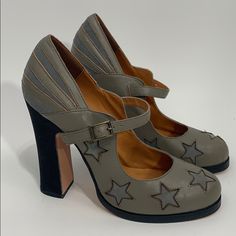 N.Y.L.A. Leather Grey With Slate Blue Suede Inset Stars And Stripes 5” Heels. Never Worn! Size 10 Gray Round Toe Heels Medium Width, Gray Round Toe Medium Width Heels, Gray Medium Width Round Toe Heels, Gray Leather Heels With Round Toe, Gray Leather Block Heel Shoes, Gray Leather Block Heels, Gray Leather Block Heel, Gray Leather Heels With Medium Width, Gray Leather Heels Medium Width