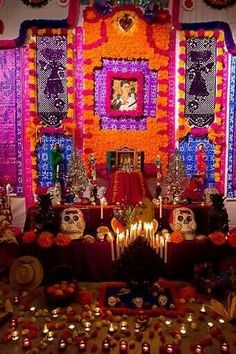 a decorated room with candles and decorations