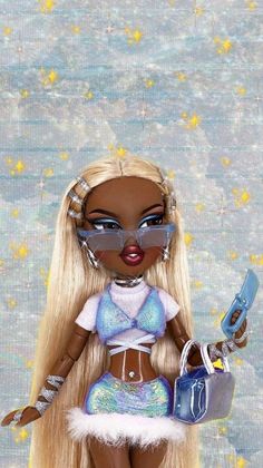 a doll with blonde hair and sunglasses holding a purse