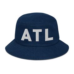 Here’s a custom ATL denim bucket hat. The letters ATL are embroidered on the front. Represent Atlanta, GA in style when your running errands or out on the town. Here’s some more details about your hat: • 100% cotton • 2 sewn eyelets on each side of the hat • Poplin sweatband • One size fits most Casual Outdoor Bucket Hat With Letter Print, Streetwear Bucket Hat With Letter Print And Curved Brim, Cotton Bucket Hat With Letter Print And Short Brim, Sporty Cotton Bucket Hat, Cotton Bucket Hat With Letter Print, Casual Summer Bucket Hat With Flat Bill, Casual Streetwear Bucket Hat With Embroidered Logo, Casual Bucket Hat With Letter Print, Casual Spring Bucket Hat With Letter Print