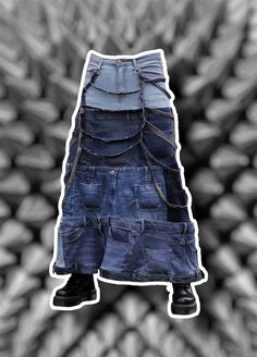 A repurposed blue denim skirt made of old jeans tops with jeans stripes hanging around and attached to silver cyrcles. This skirt is almost to floor long. SKIRTS ARE NOT JUST FOR WOMEN! The size on the picture is M. *please note  that after selling first piece (on the pictures) this is going to be made to order from repurposed blue denim so it doesn't have to look the same but it will be similar* *you can see the real cost of garment in photos* Purchasing this will mean also you are supporting sustainable fashion and garments that had been given a second life. if you need size that is not included in sizing options DM the shop Edgy Blue Denim Skirt, Reworked Blue Denim Skirt, Blue Reworked Denim Skirt, Upcycled Blue Bottoms For Festivals, Tops With Jeans, Blue Denim Skirt, Denim Diy, Jeans Tops, Old Jeans