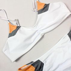 Item Type: Bikinis SetWaist: Low WaistMaterial: Polyester,SpandexGender: WomenPattern Type: Patchwork,Solid,GeometricSupport Type: Wire FreeWith Pad: YesFit: Fits smaller than usual. Please check this store's sizing infoModel Number: B3382WHBrand Name: OMKAGIis_customized: YesColor Style: Natural ColorQuality: A+++Material: 82%Ployester+18%SpandexShoulder strap: Adjustable Casual One-piece Color Block Swimwear, White Stretch Triangle Top Swimwear, White Stretch Triangle Top Tankini, Casual White Swimwear For Beach Party, White Sleeveless Tankini For Beach Season, White Sleeveless Summer Tankini, White Triangle Top Swimwear For Vacation, White Beachwear Tankini For Swimming, White Stretch Swimwear For Vacation