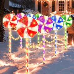 PRICES MAY VARY. 【Large 28 Inch Outdoor Christmas Lollipop Light with Light Strip】: This is a upgraded Christmas light featuring large lollipop shapes above the candy canes. Each light is connected by light strips in between, each interval has 10 LED, each lollipop light has 20 LED, super bright, add a romantic and cozy touch to your holiday display. 【230 Super Bright LED】: Featuring with 230 bright warm white LED lights, 14 LED of each lollipop topper, 6 LED of each post, 10 LED of each light s Christmas Lollipop Decorations, Christmas Lights Inside, Christmas Pathway Lights, Snowflake Christmas Lights, Lollipop Decorations, Large Lollipops, Christmas Lights Outside